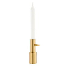 Cargar imagen en el visor de la galería, Brass candle holder with a white candle on a white background