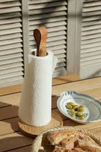 Cargar imagen en el visor de la galería, White ceramic holder with wooden spoon on a wooden surface with a blurred background