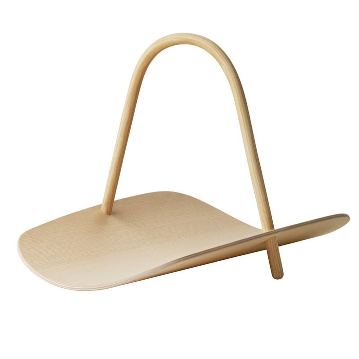 Wooden shelf with curved design on a white background