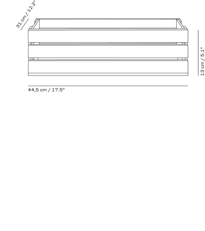 Dimensions of a rectangular object with measurements in centimeters and inches.