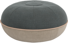 Cargar imagen en el visor de la galería, Round ottoman with two-tone fabric design on a white background
