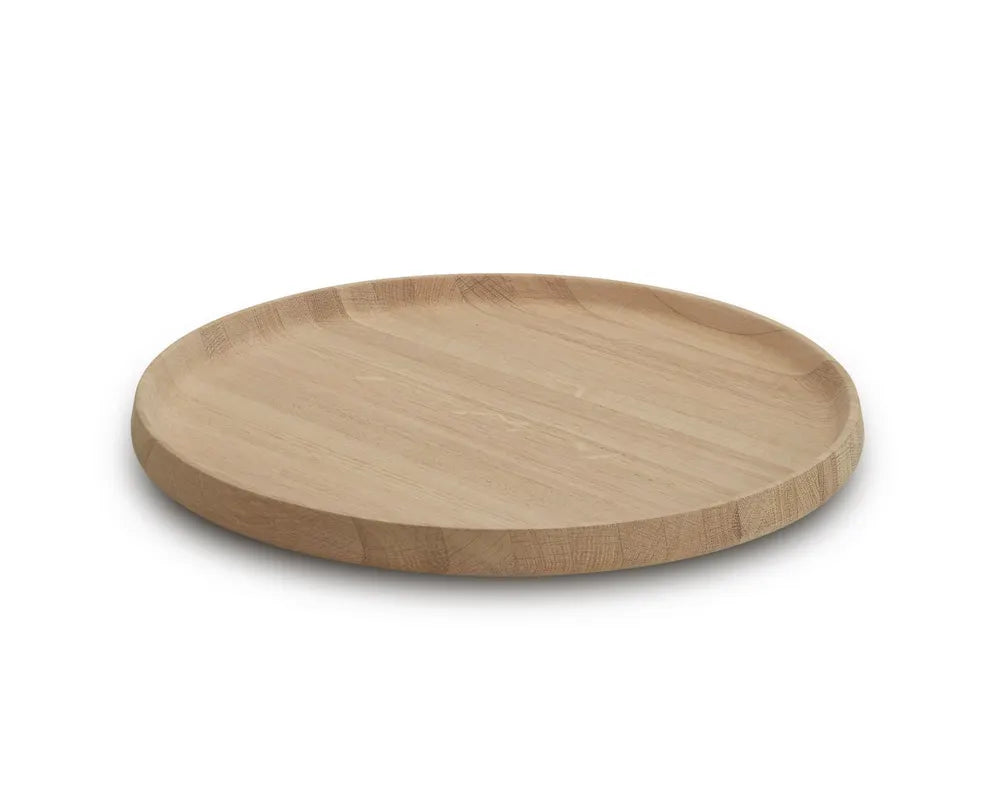 Round wooden tray on a white background